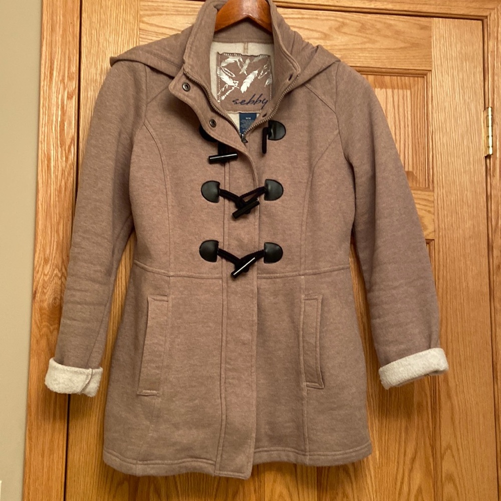 Sebby tan peacoat-like jacket in sweatshirt-like material.
